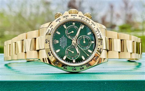 Rolex gold with green dial